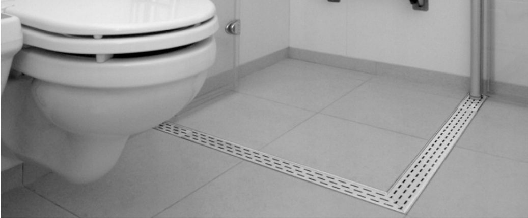 Sprchový žľab - Rohový odtok INOX 70cm - zakrýva línie